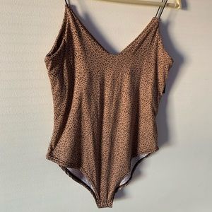 Leopard print body suit